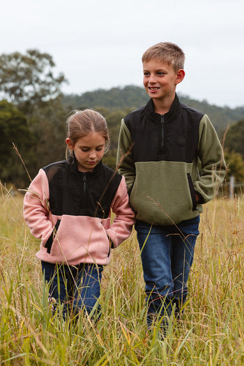 A kid wearing hat and work shirt from kids new arrival collection